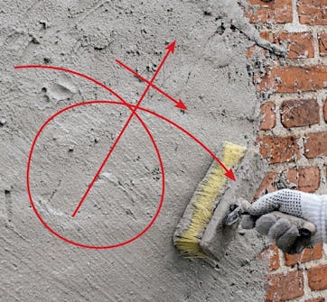 Tiiliseinän rappaus: Tiivis laastipinta harjataan kostealla muurarin harjalla Tiiliseinän rappaus: Tiivis laastipinta harjataan kostealla muurarin harjalla